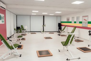 Bright and spacious gym interior featuring modern green exercise machines in Yalova.